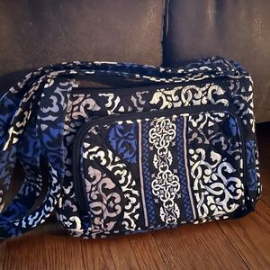 Vera Bradley small, adjustable crossbody bag.